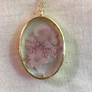 Pink on pink pressed flower necklace.